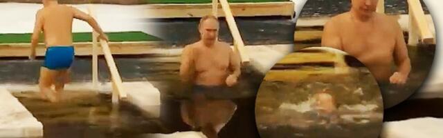 Nema zime za Putina! Pogledajte kako predsednik Rusije obeležava Bogojavljenje: Zaronio u hladnu vodu dok se sve ledi (VIDEO)