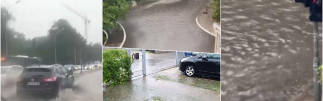 SASTAVILO NEBO I ZEMLJU U BEOGRADU: Obilna kiša poplavila ulice širom prestonice, grmljavina ne prestaje, upozorenje RHMZ i dalje na snazi (FOTO/VIDEO)