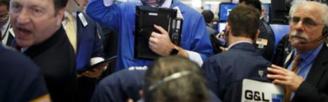 Акције варирају док трговци очекују да ФЕД смањи каматне стопе