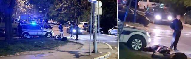 Akcija policije na Zvezdari: Uhapšeni muškarci vezanih ruku leže na trotoaru (VIDEO/FOTO)