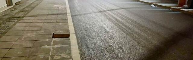 Asfaltirani deo ulice i trotoar u ulici Pana Đukića