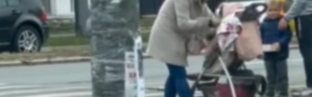 STRAVIČAN SNIMAK IZ NOVOG SADA Žena brutalno šamara bebu u kolicima, ljudi ne reaguju (VIDEO)