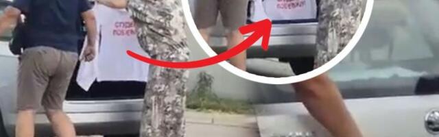 PROVOKACIJA PREKO PUTA ŠTANDOVA SNS! Iz automobila sa hrvatskim tablicama vadili majicu "Studenti pobeđuju"!