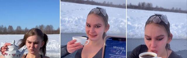 Izranja iz zaleđenog jezera i pije kafu na -27 (VIDEO)