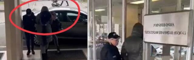 POGLEDAJTE PRIVOĐENJE ČLANICE TEHNIČKE KOMISIJE! Ovako su lisice stavljene na ruke Jeleni Vesić! (VIDEO)