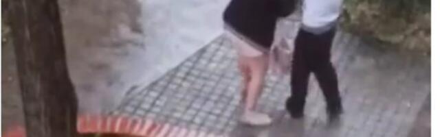 GURA ŽENU, UDARA JE, BACA NA ZEMLJU I NASTAVLJA DA JE BIJE! Jezive scene nasilja u Zemunu! (FOTO)