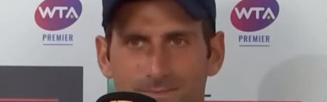 Novak je samo klimao glavom uz osmeh dok je slušao pitanje o rušenju dva velika rekorda Federera