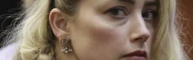 Амбер Херд  пристала да се нагоди са Џонијем Депом за клевету
