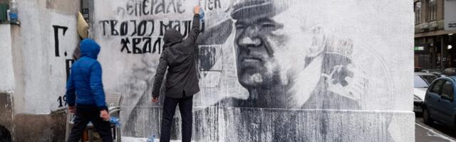 Mladic mural painted over, nationalists cleaning it