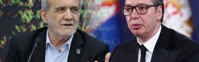 Serbian President Aleksandar Vucic speaks with Iranian President Masoud Pezeshkian